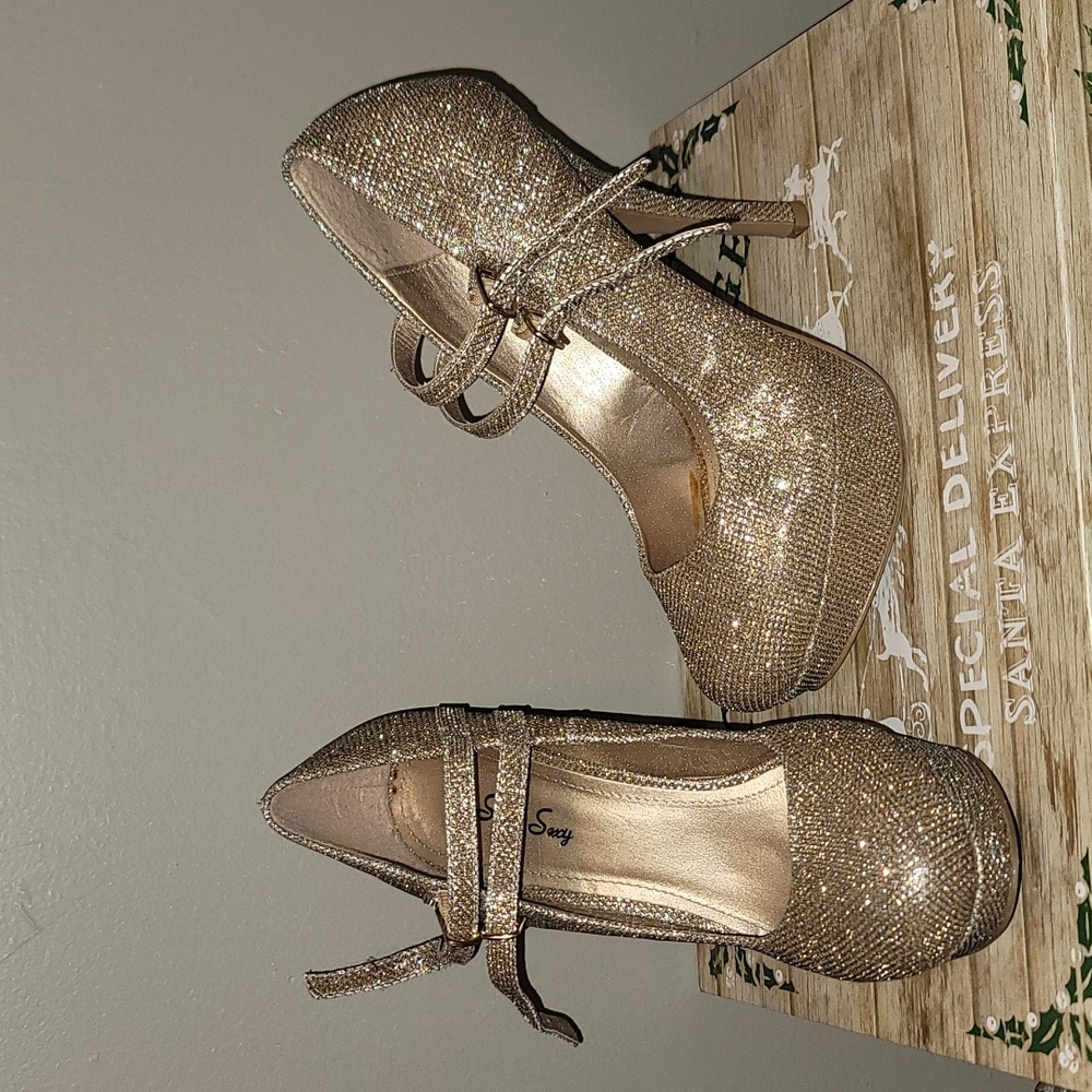 Gold stilettos
